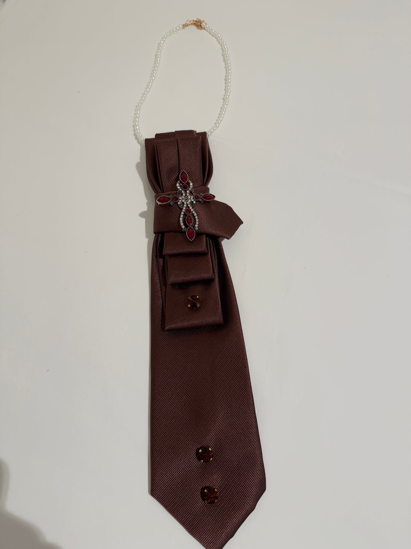 Brown Tie With Red And Gold Brooch